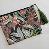 Assorted printed zip clutch