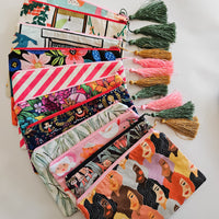 Assorted printed zip clutch