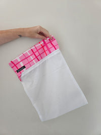 Pink check laundry/garment bags