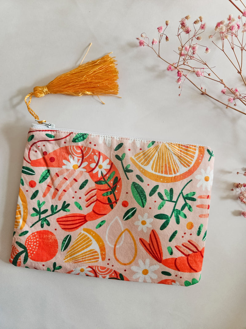 Assorted printed zip clutch