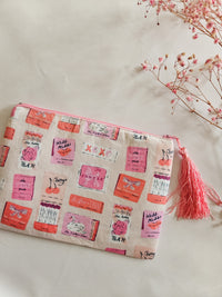 Assorted printed zip clutch